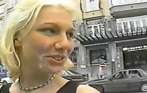 Exhibitionist blond displays cummy face in public
