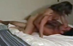 Amateur couple has sex in bed