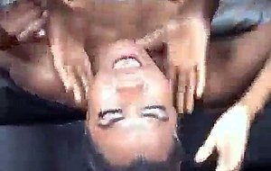 Black girl on sofa gets cock stuffed down her throat