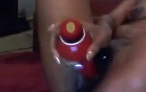 Sexy ebony babe toys her pussy and squirts