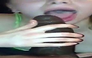 Watch her play with black cum